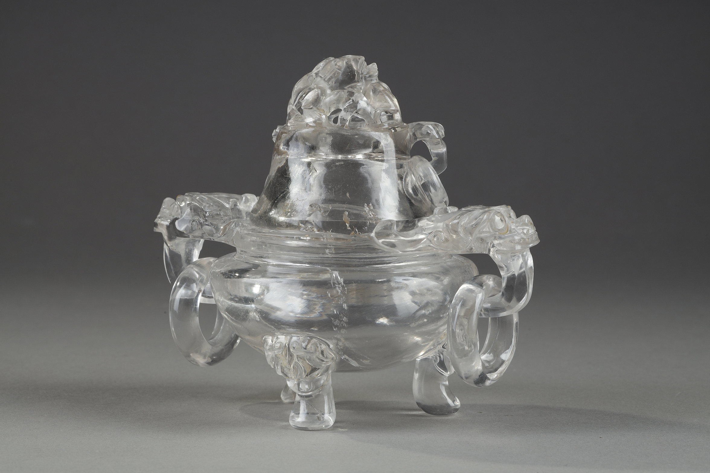 small rock crystal perfume burner
 carved with Taotie masks and rings . china 19th century